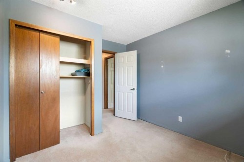 8 Hawkwood Place Nw, Calgary, AB - Indoor Photo Showing Other Room