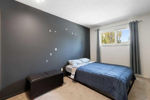 8 Hawkwood Place Nw, Calgary, AB - Indoor Photo Showing Bedroom