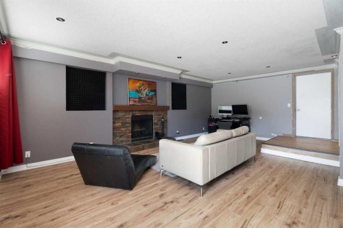 8 Hawkwood Place Nw, Calgary, AB - Indoor With Fireplace