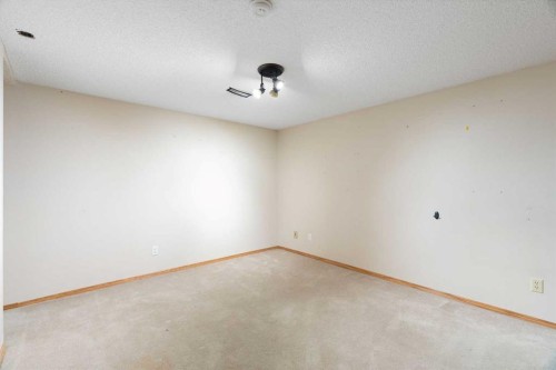 8 Hawkwood Place Nw, Calgary, AB - Indoor Photo Showing Other Room