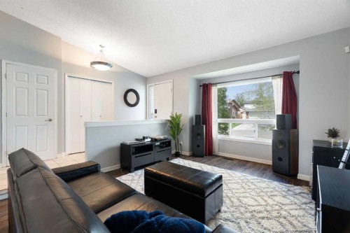 8 Hawkwood Place Nw, Calgary, AB - Indoor Photo Showing Living Room