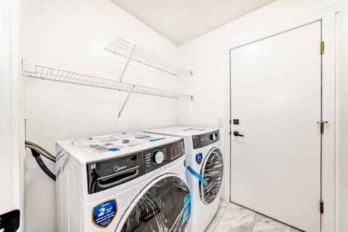 12634 Coventry Hills Way Ne, Calgary, AB - Indoor Photo Showing Laundry Room