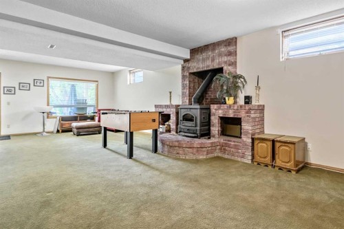 35 Candle Court Sw, Calgary, AB - Indoor With Fireplace