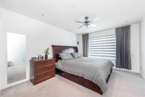 32 Saddlestone Way Ne, Calgary, AB - Indoor Photo Showing Bedroom