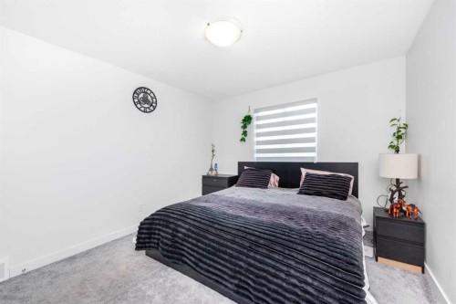 32 Saddlestone Way Ne, Calgary, AB - Indoor Photo Showing Bedroom
