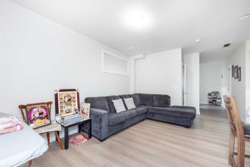 32 Saddlestone Way Ne, Calgary, AB - Indoor Photo Showing Living Room
