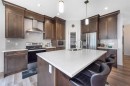 32 Saddlestone Way Ne, Calgary, AB  - Indoor Photo Showing Kitchen With Upgraded Kitchen 