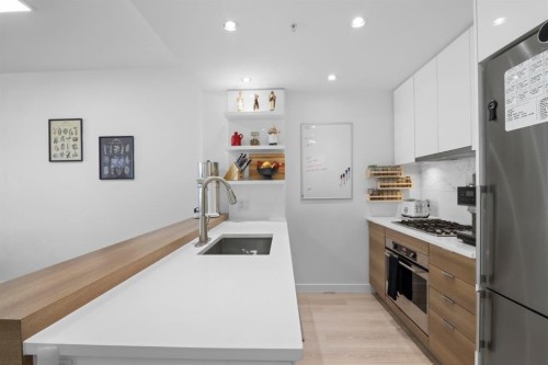 501-138 Waterfront Court Sw, Calgary, AB - Indoor Photo Showing Kitchen