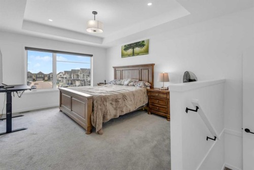 41 Copperhead Road Se, Calgary, AB - Indoor Photo Showing Bedroom