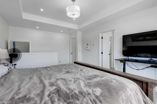 41 Copperhead Road Se, Calgary, AB - Indoor Photo Showing Bedroom
