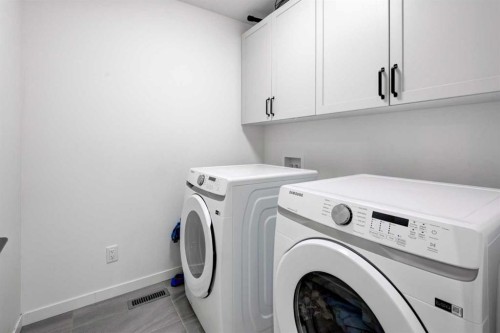 41 Copperhead Road Se, Calgary, AB - Indoor Photo Showing Laundry Room