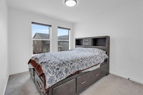 41 Copperhead Road Se, Calgary, AB - Indoor Photo Showing Bedroom