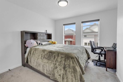 41 Copperhead Road Se, Calgary, AB - Indoor Photo Showing Bedroom