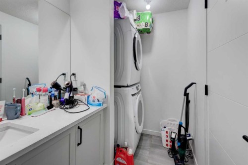 41 Copperhead Road Se, Calgary, AB - Indoor Photo Showing Laundry Room