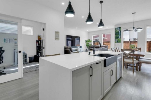 41 Copperhead Road Se, Calgary, AB - Indoor Photo Showing Kitchen With Double Sink