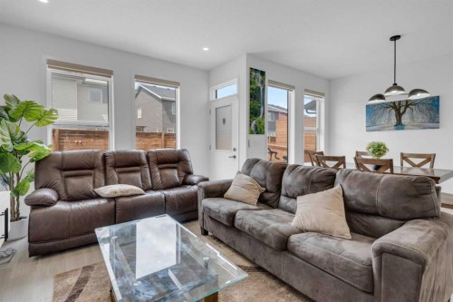41 Copperhead Road Se, Calgary, AB - Indoor Photo Showing Living Room