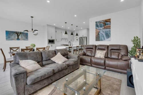 41 Copperhead Road Se, Calgary, AB - Indoor Photo Showing Living Room