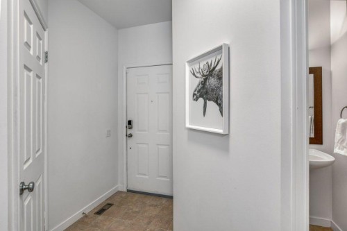 128 Sunterra Heights, Cochrane, AB - Indoor Photo Showing Other Room