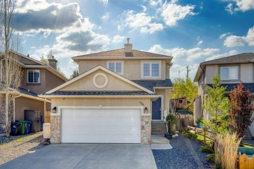 128 Sunterra Heights, Cochrane, AB - Outdoor With Facade