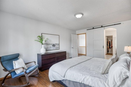 128 Sunterra Heights, Cochrane, AB - Indoor Photo Showing Bedroom