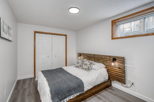 128 Sunterra Heights, Cochrane, AB - Indoor Photo Showing Bedroom