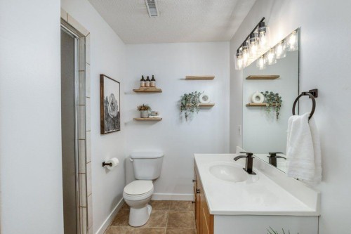 128 Sunterra Heights, Cochrane, AB - Indoor Photo Showing Bathroom