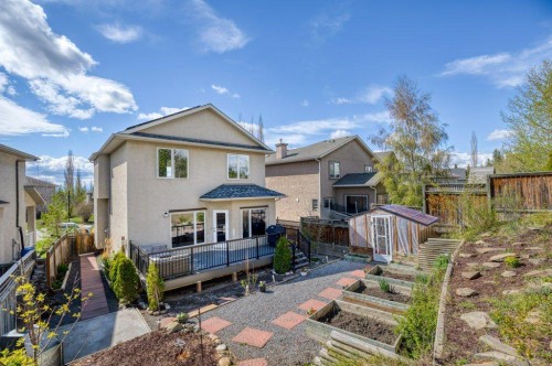 128 Sunterra Heights, Cochrane, AB - Outdoor With Deck Patio Veranda