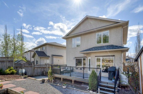 128 Sunterra Heights, Cochrane, AB - Outdoor With Deck Patio Veranda