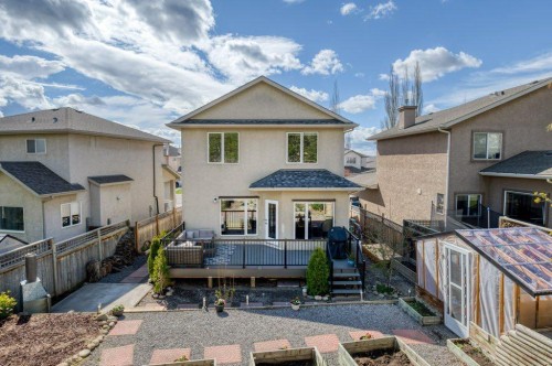 128 Sunterra Heights, Cochrane, AB - Outdoor With Deck Patio Veranda