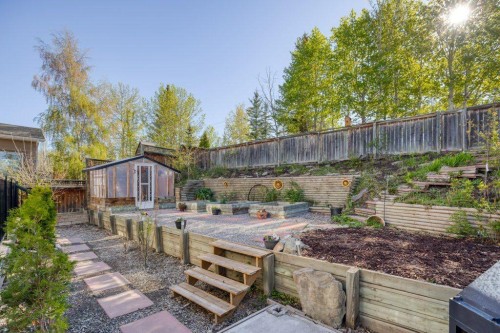 128 Sunterra Heights, Cochrane, AB - Outdoor With Deck Patio Veranda