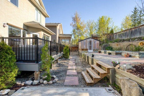 128 Sunterra Heights, Cochrane, AB - Outdoor With Deck Patio Veranda