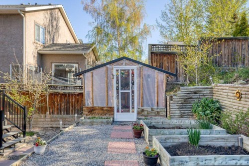 128 Sunterra Heights, Cochrane, AB - Outdoor With Deck Patio Veranda