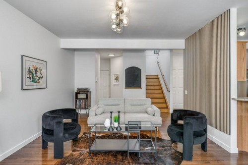 128 Sunterra Heights, Cochrane, AB - Indoor Photo Showing Living Room