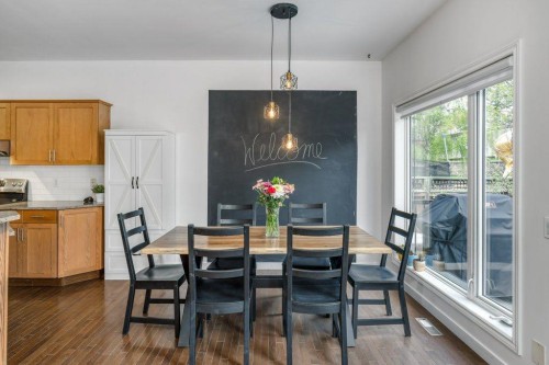 128 Sunterra Heights, Cochrane, AB - Indoor Photo Showing Dining Room