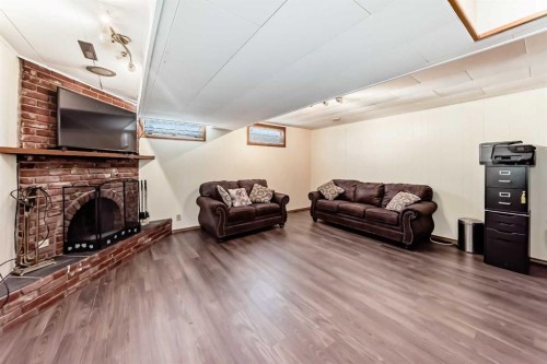 5007 Vallance Crescent Nw, Calgary, AB - Indoor With Fireplace