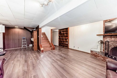 5007 Vallance Crescent Nw, Calgary, AB - Indoor With Fireplace
