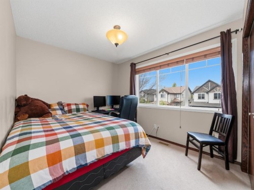 28 Cranberry Lane Se, Calgary, AB - Indoor Photo Showing Bedroom