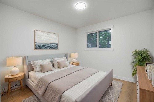 9532 Allison Drive Se, Calgary, AB - Indoor Photo Showing Bedroom