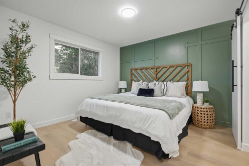 9532 Allison Drive Se, Calgary, AB - Indoor Photo Showing Bedroom