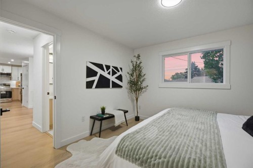 9532 Allison Drive Se, Calgary, AB - Indoor Photo Showing Bedroom