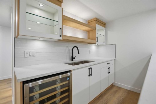 9532 Allison Drive Se, Calgary, AB - Indoor Photo Showing Kitchen With Double Sink