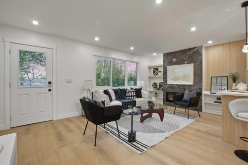9532 Allison Drive Se, Calgary, AB - Indoor Photo Showing Living Room