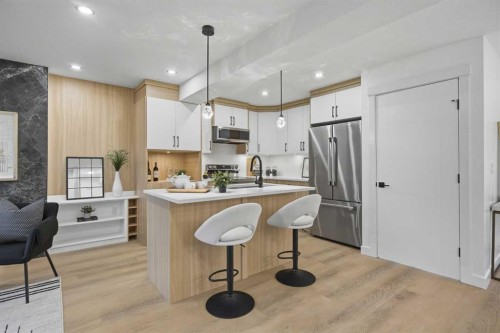 9532 Allison Drive Se, Calgary, AB - Indoor Photo Showing Kitchen With Upgraded Kitchen