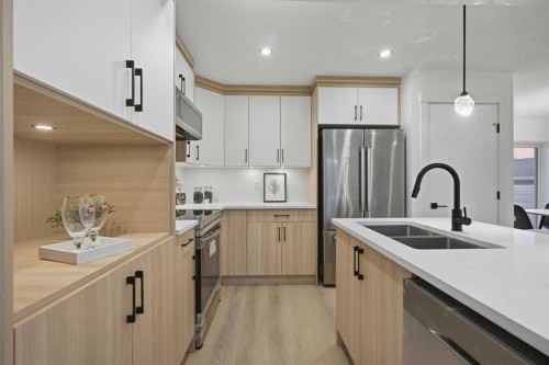 9532 Allison Drive Se, Calgary, AB - Indoor Photo Showing Kitchen With Stainless Steel Kitchen With Double Sink With Upgraded Kitchen