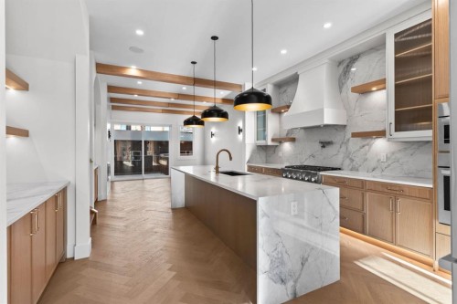 907 36A Street Nw, Calgary, AB - Indoor Photo Showing Kitchen With Upgraded Kitchen