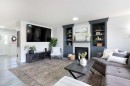 8 Thorndale Close Se, Airdrie, AB  - Indoor Photo Showing Living Room With Fireplace 