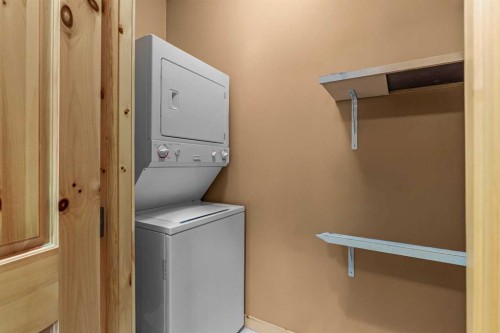 1003-70 Dyrgas Gate, Canmore, AB - Indoor Photo Showing Laundry Room