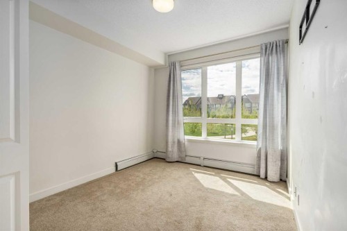 3210-175 Silverado Boulevard Sw, Calgary, AB - Indoor Photo Showing Other Room