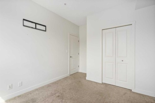 3210-175 Silverado Boulevard Sw, Calgary, AB - Indoor Photo Showing Other Room
