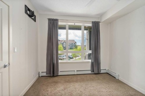 3210-175 Silverado Boulevard Sw, Calgary, AB - Indoor Photo Showing Other Room